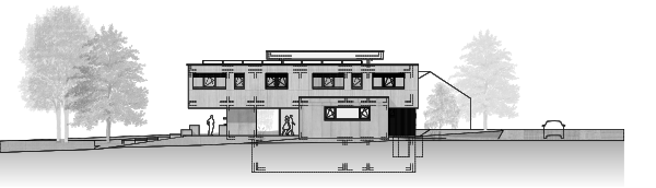 Le long volume en bois de l’étage posé sur le rez